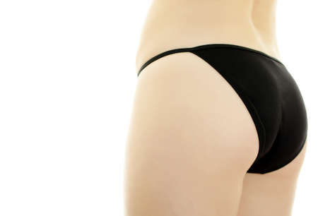 Woman body in black swimsuit  Isolated on white の写真素材