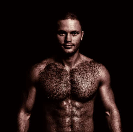 Portrait of a handsome naked muscular guy.の写真素材