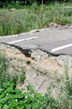 Destroyed asphalt road
