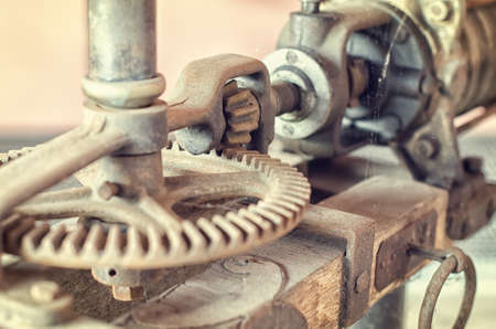 Old rusty cogwheel for wine making machine.の写真素材