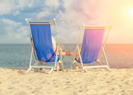 Couple enjoying summer vacation on the beachの写真素材