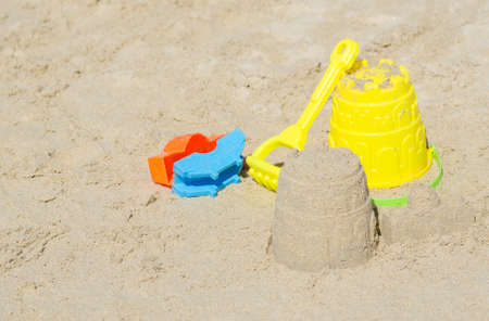 Children beach toys on the sand の写真素材