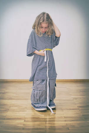 I think I lost too much weight. Conceptual photo.の写真素材