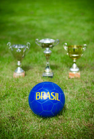 Victory celebration  Soccer trophies near the ball の写真素材
