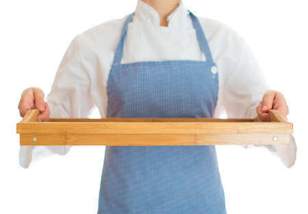 Chef cook holding tray. Isolated on white.の写真素材