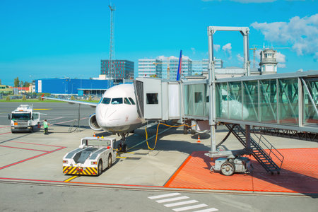 Passenger plane maintenance in airport before flight.