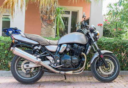 Modern motorcycle parked on the street.