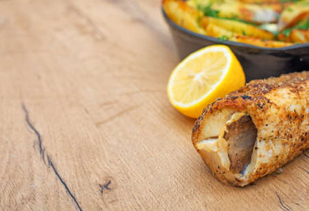 Fried fish and potatoes. Place for your text.の写真素材