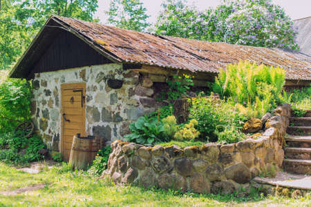 Old rural stone barn on farm.の写真素材