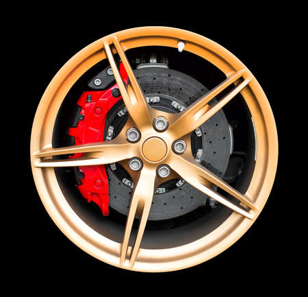 Sports car rim isolated on black background.の写真素材