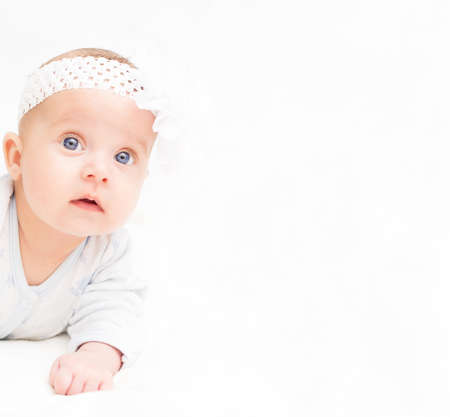 Cute little baby. Place for your text.の写真素材