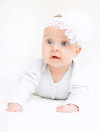 Cute little baby. Place for your text.の写真素材