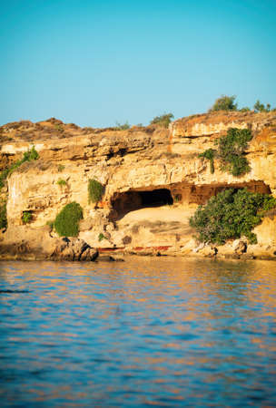 Desert cave in the rock on the beach.の写真素材