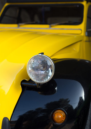 Part of old retro yellow car.