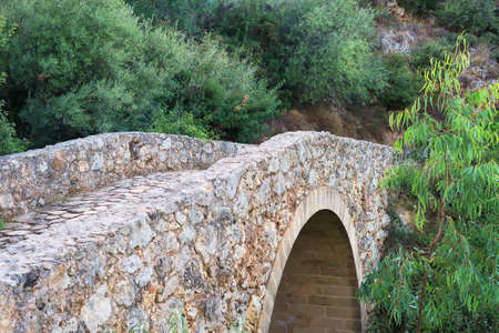 Old stone bridge over the river.の写真素材