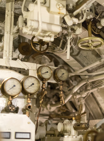 Detailed view of many manometers inside of submarine.