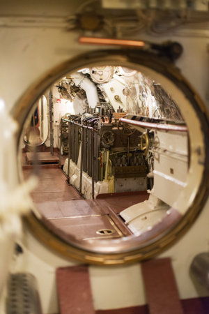 Inside of submarine. View of Diesel engine.