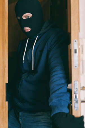 Thief entering the private property.の写真素材