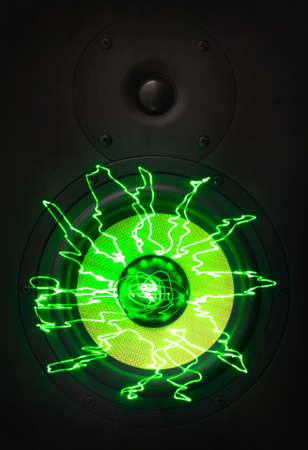 Music monitor speakers with green laser rays.の写真素材