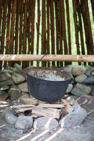 Pot for cooking over the fire.の写真素材