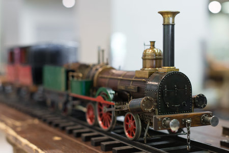 Miniature model of vintage train with wagons.