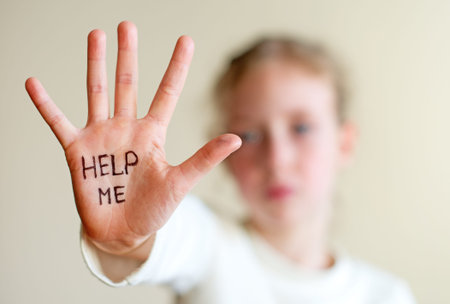 Child need help. Violence concept.の写真素材
