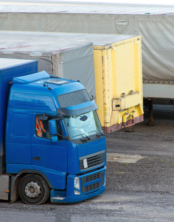 Trucks parked on a parking lot.の写真素材
