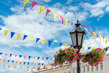 Lantern decorated with flowers on the city days.の写真素材