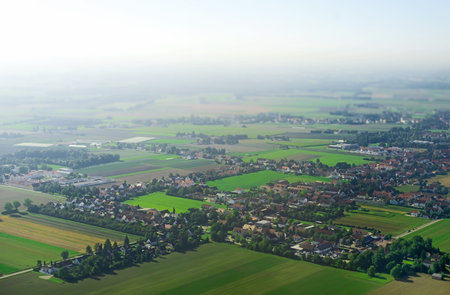Aerial view of village at foggy morning.