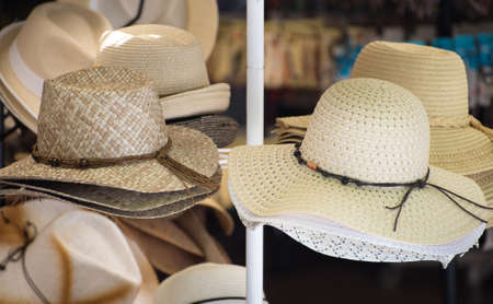 Straw hats for sale in the market.の写真素材