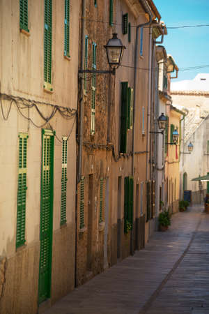 Beautiful narrow old street in mediterranean city.の写真素材