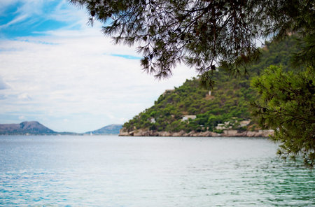 Beautiful coastline with mountains. Place for text.