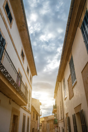 Beautiful narrow old street in mediterranean city.