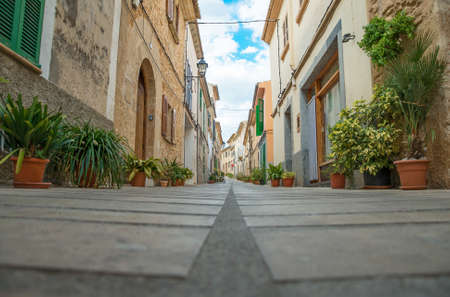 Beautiful narrow old street in mediterranean city.の写真素材