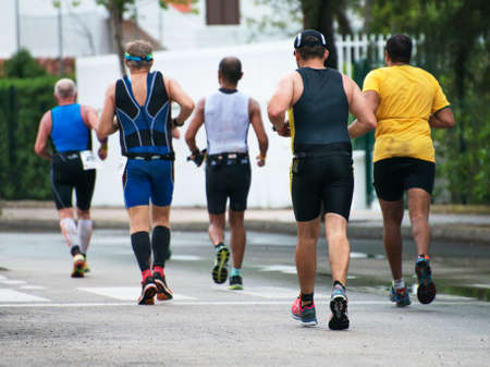 Group of marathon runners on the street.の写真素材