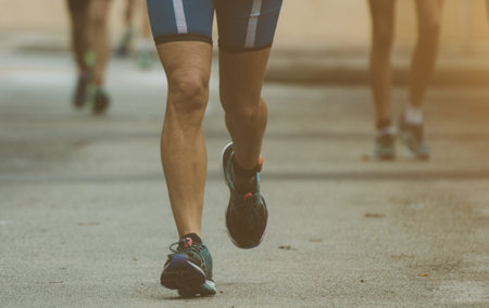 Group of marathon runners on the street.
