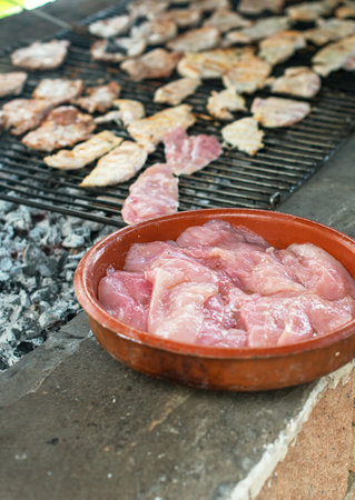 Meat steak barbecue on the grill outdoors.の写真素材