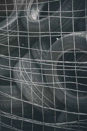 Used old car tires on the street.の写真素材