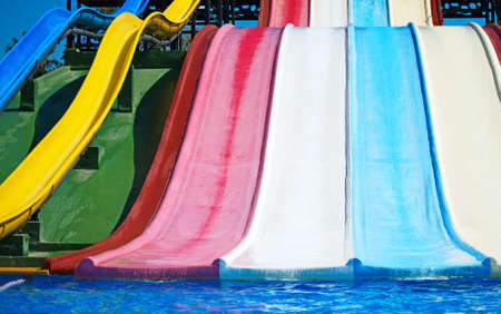 Colorful plastic water-slides in aqua park.の写真素材