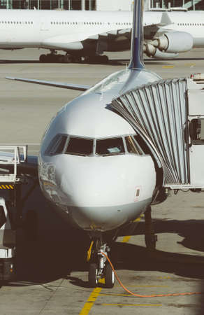 Passenger plane in the airport. Aircraft maintenance.の写真素材