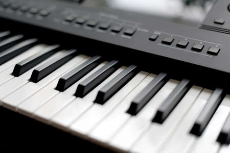 Professional midi keyboard synthesizer with knobs and controllers.の写真素材