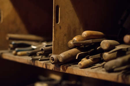 Many old instruments in blacksmith's house.の写真素材