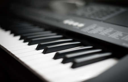 Professional midi keyboard synthesizer with knobs and controllers.の写真素材