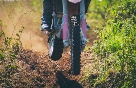 Professional motocross rider on the road.の写真素材