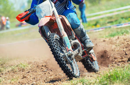 Professional motocross rider on the road.の写真素材