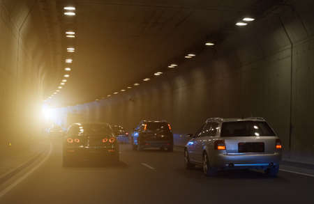 Cars driving through the tunnel.の写真素材