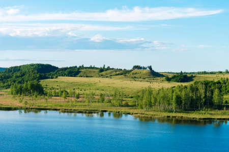 Pond and forest in Izborsk, Russia.の写真素材