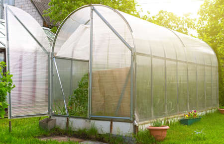 Traditional old greenhouse in the garden.の写真素材