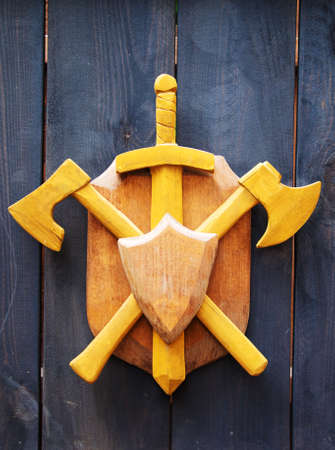 Two axes, a sword and a shield.の写真素材