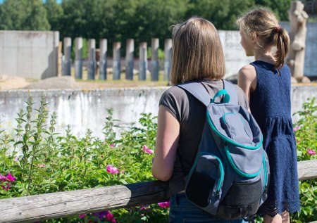 Woman and her daughter visiting zoo.の写真素材